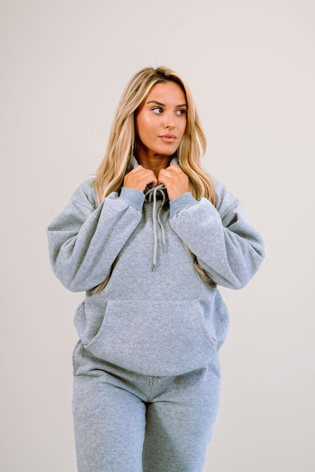 grey hoodie with drawstring and kangaroo pocket